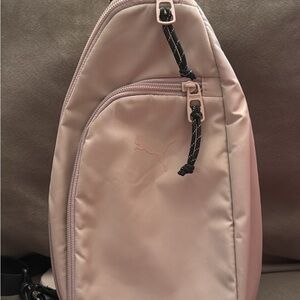 Puma cream colored sling bag